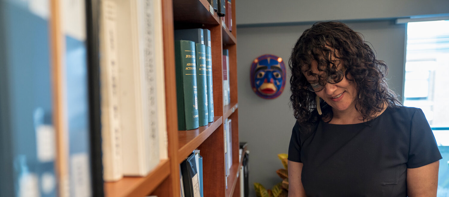 Woman reading in aboriginal law office