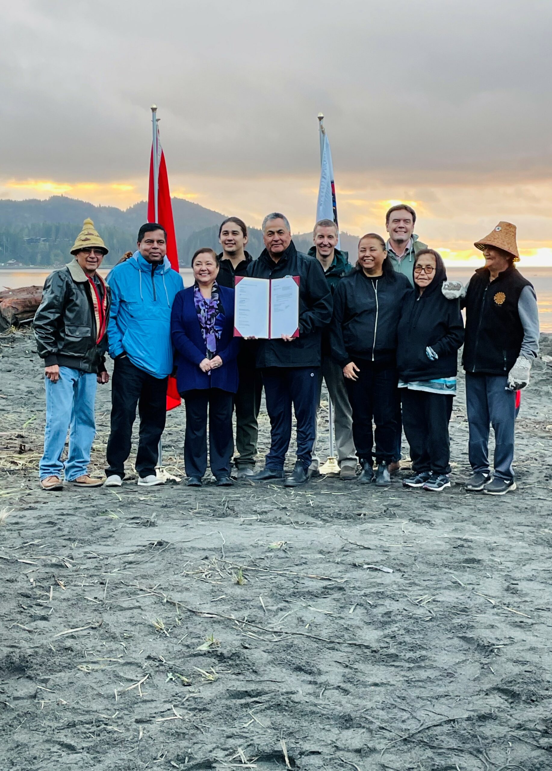 Pacheedaht Chief Jeff Jones holds signed agreement returning stewardship of ?a:?b?e:?s